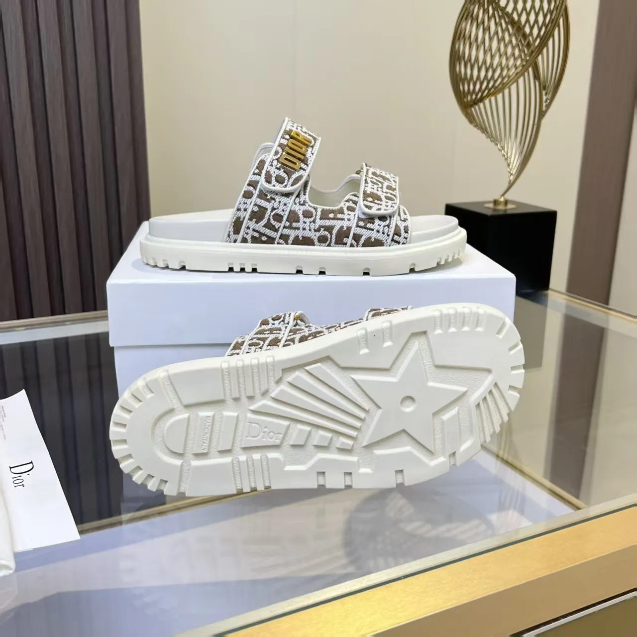 👟👟Ex-factory price 480👟👟 Dior classic popular sandals Step into the fashion territory of Dior slippers and encounter the ultimate fusion of elegance and comfort. The upper is engraved with the Christian Dior Paris logo using exquisite embroidery technology. The delicate stitching tells the brand's profound heritage and is fully recognizable.   Made of high-quality materials, it feels soft and fits your feet, as if it is a gentle care tailor-made for your feet. The sole is carefully designed and engraved with Christian Dior's lucky star symbol. It is not only a beautiful embellishment, but also provides reliable grip, making every step steady and secure.   It has a simple design and is easy to put on and take off. Whether it is a lazy weekend or a pleasant vacation, it can be easily adapted. Whether paired with casual shorts, casual jeans, or an elegant dress, Dior slippers can instantly enhance the overall style and show a casual fashion attitude.   Dior slippers, in the name of fashion, inject luxurious charm into your life and accompany you with every step you take with confidence and elegance. Material: Fine genuine cowhide upper, outsole, TPR, non-slip and wear-resistant, code number: 35-41 (42 customized)